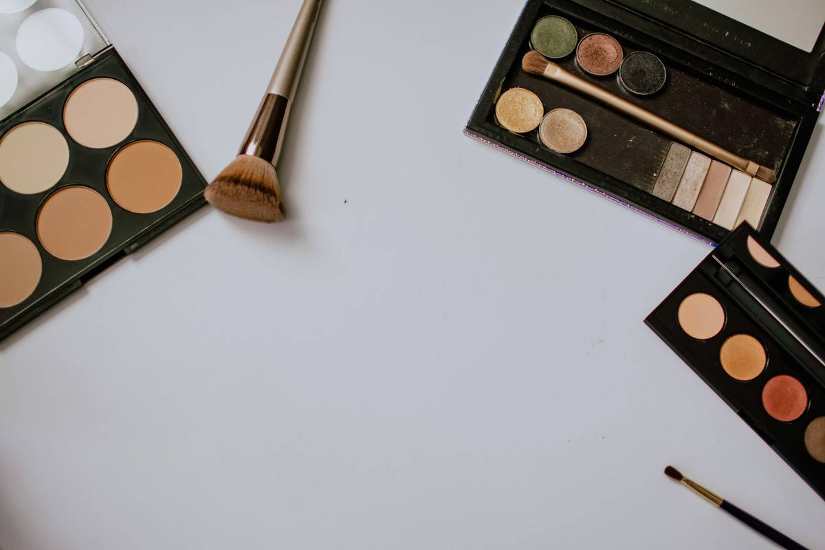 Side-by-side comparison showing flawless bronzer application using cosmetic bronzer brush vs. smudged result with regular brush